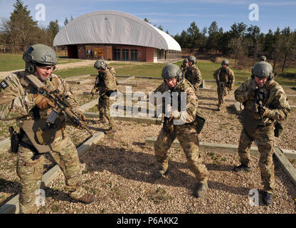 Members of the US Federal Bureau of Investigation's Milwaukee Special Weapons and Tactics team prepare for live fire shoothouse training at range 36 at Fort McCoy Wis. on 27 April 2016.  Fort McCoy is one of three Total Force Training centers in the United states and trains more than 100,000 US military personel each year.  Many of the training facilities are also available to federal, state and local law enforcement.  Photo by Jamal Wilson Stock Photo