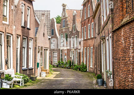 Blokzijl, The Netherlands, June 9, 2018: well-preserved ancient houses in Kerkstraat in the old town Stock Photo