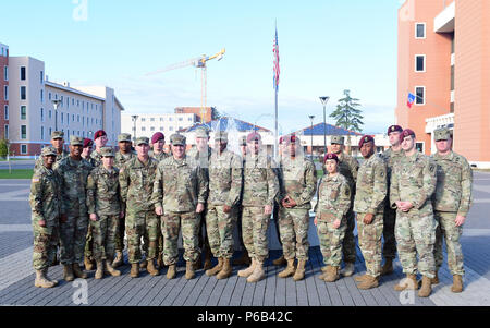 Gen. Mark Milley, the 39th Chief of Staff United States Army, U.S. Army Africa Commanding General, Maj. Gen. Joseph Harrington and Command Sgt. Maj. Christopher Gilpin, USARAF Command Sergeant Major, 173rd Airborne Brigade Commander, Col. Gregory Anderson, pose for a group photo with paratroopers, Oct. 27, 2016, during a visit to the 173rd Airborne Brigade’s Headquarters at Caserma Del Din in Vicenza, Italy. The 173rd Airborne Brigade is the U.S. Army Contingency Response Force in Europe, capable of projecting ready forces anywhere in the U.S. European, Africa or Central Commands areas of resp Stock Photo