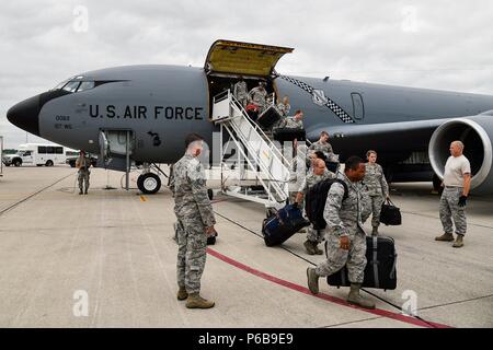 Members from the 127th Air Refueling Group, Selfridge Air National Guard Base, Mich., arrive home from Riga International Airport, Latvia after supporting a several week long exercise, Sabre Strike 18 on June 22, 2018. The 127th Air Refueling Group performed air-to-air refueling to the Michigan Air National Guard A-10 Thunderbolt IIs and Colorado Air National Guard F-16 Fighting Falcons allowing the aircraft to extend their projection of air power. Saber Strike is a longstanding U.S. Army Europe-led cooperative training, designed to enhance readiness and interoperability among allies and regio Stock Photo