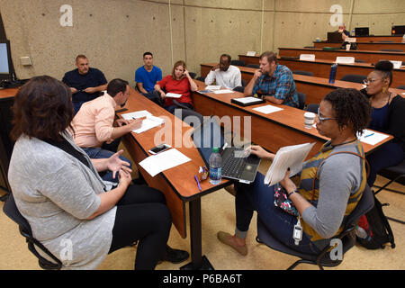 Hydropower Acquisition Course is a training program conducted by the United States Army Corps of Engineers focused on project planning and contracting for hydroelectric infrastructure. Participants analyze scenarios and develop solutions during a culminating exercise held June 22, 2018 in Nashville, Tennessee at Tennessee State University. The archival image documents technical training in project management. Stock Photo