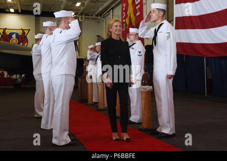 180623-N-PE636-0141  MARSEILLE, France (June 23, 2018) Jamie D. McCourt, U.S. Ambassador to the French Republic and Principality of Monaco, is saluted by the sideboy during a reception aboard the Nimitz-class aircraft carrier USS Harry S. Truman (CVN 75). Harry S. Truman is deployed as part of an ongoing rotation of U.S. forces supporting maritime security operations in international waters around the globe. (U.S. Navy photo by Mass Communication Specialist 2nd Class Anthony Flynn/Released) Stock Photo