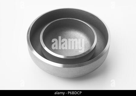 Steel caps for metal pipes in industrial production and maintenance of pipes Stock Photo