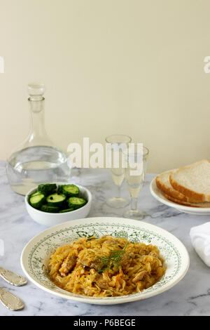 A traditional dish of some European countries is bigos made from cabbage, other vegetables and meat. Selective focus. Stock Photo