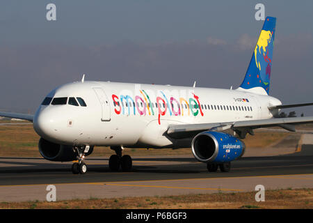 Small Planet Airlines Airbus A320 commercial jet plane taxiing for departure. Front view closeup. Stock Photo