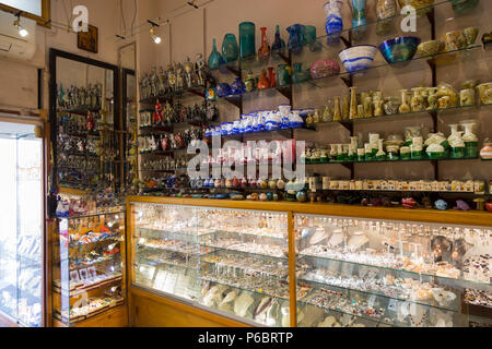 Interior display of vases and jewellery in the Joseph Busuttil Handmade Maltese Lace and souvenir shop / store in Valletta, Malta. (91) Stock Photo
