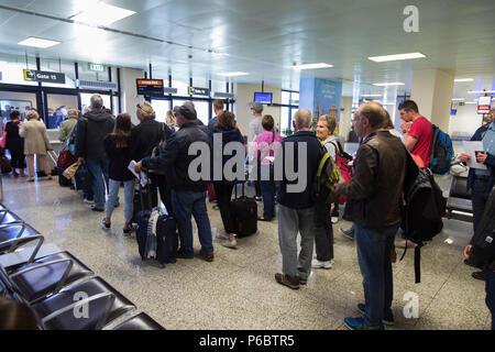 Easyjet passengers in queue / queuing / queues / waiting to board a plane at departure gate 15 at Malta International Airport. (91) Stock Photo