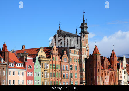 Poland - Gdansk city (also know nas Danzig) in Pomerania region. Famous apartment buildings next to Motlawa river. Stock Photo