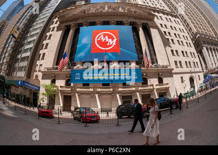 The New York Stock Exchange in Lower Manhattan in New York on Thursday, June 14, 2018 is decorated with a banner for American Axle & Manufacturing Holdings (AAM) in honor of their investor day and ringing the closing bell. (© Richard B. Levine) Stock Photo
