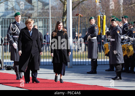 Berlin, Germany - Federal Chancellor Angela Merkel receives the Prime Minister of the Republic of Iceland, Katrín Jakobsdottir, with military honors in the honorary court of the Federal Chancellery. Stock Photo
