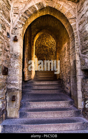 The huge original wooden door through which it is possible to come to the Top city is dated the 17th century Stock Photo