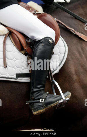 Doha, riding boots with spur in a stirrup Stock Photo