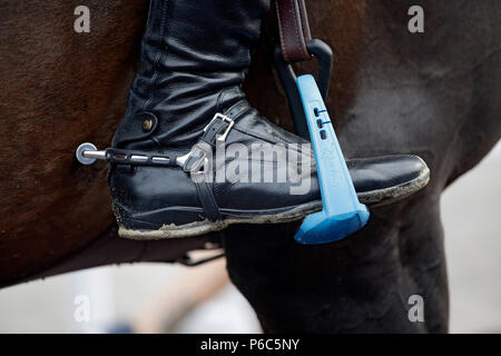 Doha, riding boots with spur in a safety platform Stock Photo