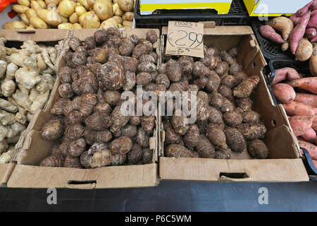 Eddoe tropical vegetable at farmers market Stock Photo