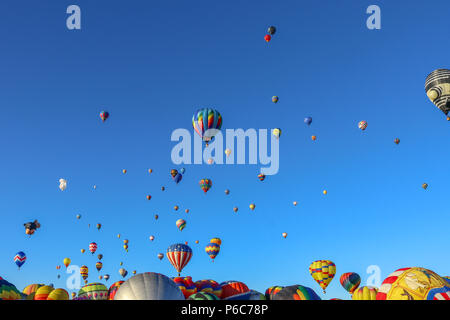 The Albuquerque International Balloon Fiesta took off with a major balloon launch with over 600 hot air balloons.  Beautiful experience. Stock Photo