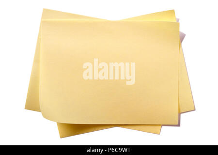 Untidy yellow sticky post notes isolated on white Stock Photo