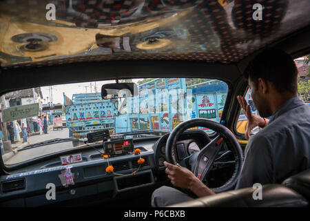 Inside a yellow Ambassador taxi – Kolkata, India Stock Photo