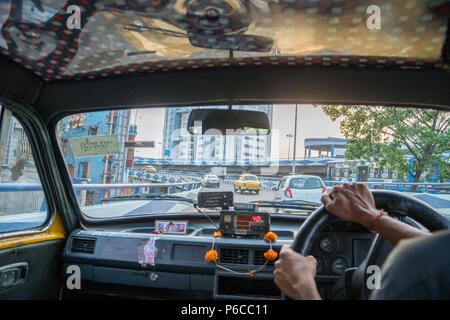 Inside a yellow Ambassador taxi – Kolkata, India Stock Photo