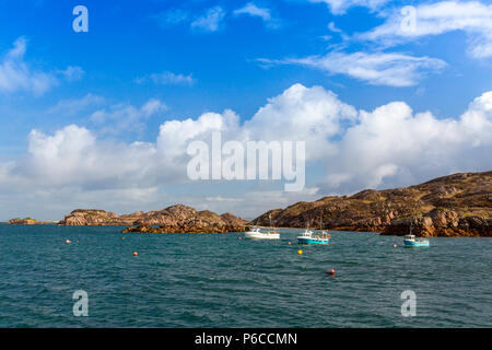 Fishing boats at anchor in the Sound of Iona at Fionnphort on the Isle of Mull, Argyll and Bute, Scotland, UK Stock Photo