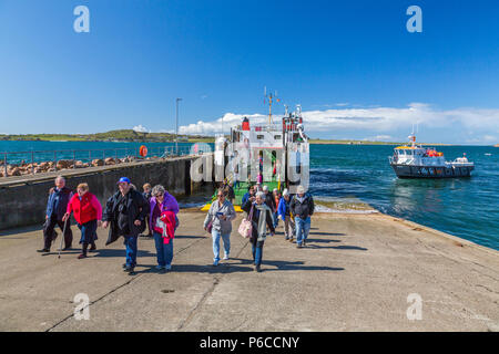 Passengers leaving the 'Loch Buie' Iona ferry at Fionnphort on the Ross of Mull, Argyll and Bute, Scotland, UK Stock Photo