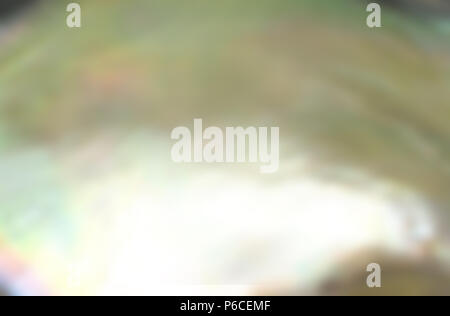 Abstract mother of pearl oyster shell background with single nacreous shine pearl Stock Photo