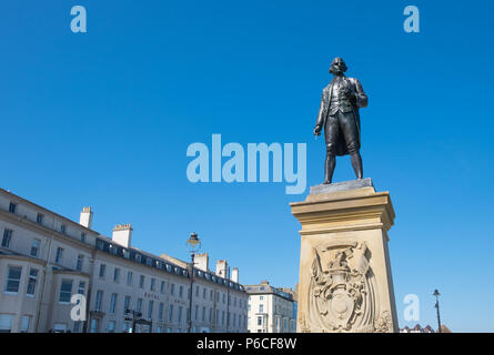 Captain James Cook statue at Whitby, North Yorkshire. Cook started his voyages of discovery at Whitby harbour near his hometown. Stock Photo