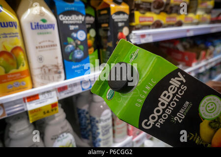 https://l450v.alamy.com/450v/p6cgg2/a-consumer-chooses-a-container-of-goodbelly-probiotic-brand-drink-in-a-supermarket-cooler-in-new-york-on-wednesday-june-20-2018-general-mills-venture-fund-301-inc-has-an-investment-in-nextfoods-the-parent-of-the-goodbelly-probiotic-brand-as-food-manufacturers-partner-with-startups-to-bring-healthier-alternatives-to-consumers-richard-b-levine-p6cgg2.jpg