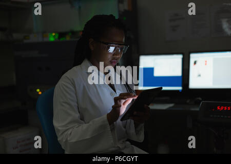 Scientist using digital tablet Stock Photo