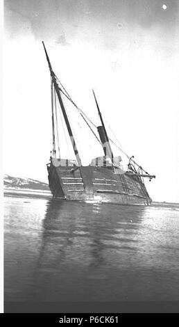. English: Wreck of the FARALLON, Iliamna Bay, January 1910 . English: The Alaska Steamship Co.'s steam schooner Farallon which serviced southeastern Alaska was wrecked in Iliamna Bay on January 5, 1910. John Thwaites was among the shipwrecked passengers. PH Coll 247.102 Subjects (LCTGM): Alaska Steamship Co.--Equipment & supplies--Alaska Subjects (LCSH): Farallon (Ship); Cargo ships--Alaska--Iliamna Bay; Shipwrecks--Alaska--Iliamna Bay; Iliamna Bay (Alaska)  . 1910 82 Wreck of the FARALLON, Iliamna Bay, January 1910 (THWAITES 51) Stock Photo