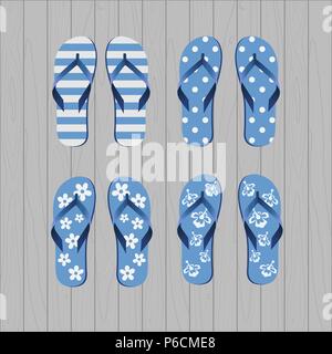 Four pair of different flip flops - blue white colors on grey wooden background Stock Vector