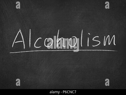 alcoholism concept word on a blackboard background Stock Photo