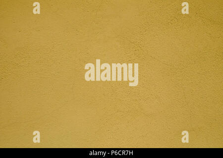 Painted plaster house wall closeup as background Stock Photo