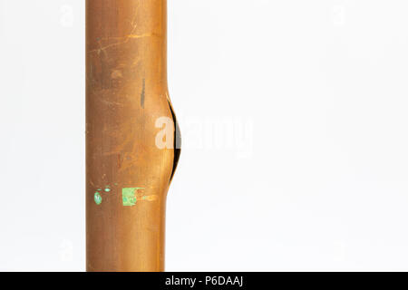 Burst copper water pipe due to frost Stock Photo