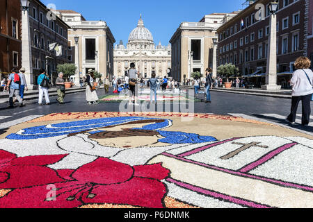 Rome, Italy. 29th June, 2018. On the occasion of the feast of St. Peter and St. Paul, the two patron saints of Rome, returns the historic Infiorata, a spectacular carpet of flowers that leads down Via della Conciliazione and towards the River Tiber. Rome, Italy, Europe, European Union, EU. Credit: Glenstar/Alamy Live News Stock Photo