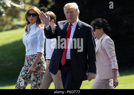 Washington, DC. 29th June, 2018. U.S. President Donald Trump, First Lady Melania Trump, her mother Amalija Knavs and Baron Trump walk to board Marine One departing the South Lawn of the White House in Washington, DC, U.S. on June 29, 2018 in Washington, DC. Credit: Toya Sarno Jordan/CNP | usage worldwide Credit: dpa/Alamy Live News