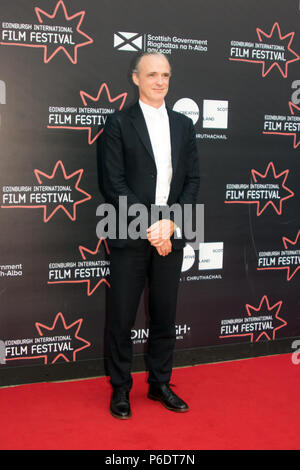 Edinburgh, Scotland, UK. 29th June, 2018. Travis' Fran Healy, on the red carpet for the world film premiere of Almost Fashionable: A Film About Travis, at Cineworld, Edinburgh, Scotland. 'Music journalist, Wyndham Wallace, has always been clear that he is not a big fan of Scottish band, Travis. When lead singer, Fran Healy, invites Wallace to join Travis on tour in Mexico, the journalist is intrigued and bemused.' This screening is part of the Edinburgh International Film Festival 2018 (EIFF), which runs between 20th June and 1st July, 2018. Iain McGuinness / Alamy Live News Stock Photo