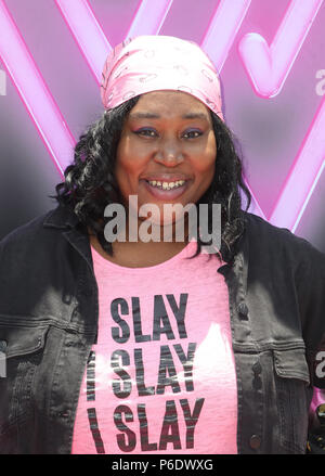 VENICE, CA - JUNE 29: Kia Stevens, at the Cast Of Netflix's 'Glow' Celebrates Premiere Of Season 2 With 80's Takeover On Muscle Beach at Muscle Beach in Venice, California on June 29, 2018. Credit: Faye Sadou/MediaPunch Stock Photo