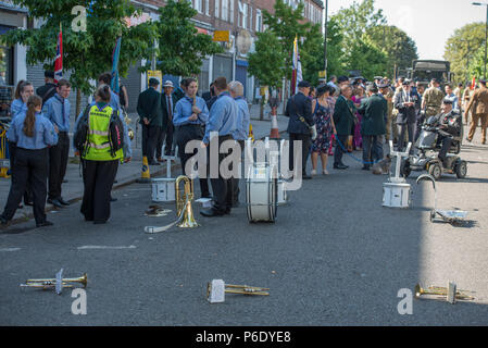 Morden, Surrey, UK. 30 June, 2018. Armed Forces Day Parade takes place at 09.45am with a march past, the salute taken by the Deputy Lieutenant and Mayor of Merton, with dignitaries and local MPs outside Merton Civic Centre on roads closed to traffic. Taking part are members of the Royal British Legion, British Army, Royal Navy, Royal Air Force and London Nepalese (Gurkha) Association. Credit: Malcolm Park/Alamy Live News. Stock Photo