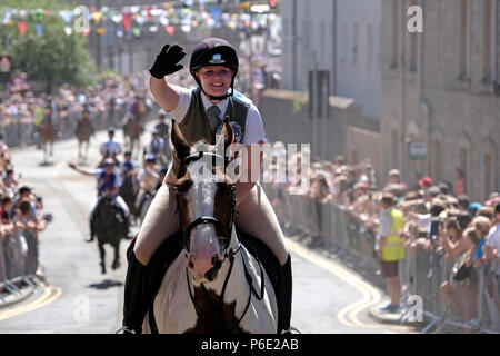Galashiels, Scotland, UK, June 30:    Braw Lads' Day 2018 (Braw Lads Gathering) Horsemen and horsewomen ride their horses up the town street during the Braw Lads Gathering annual festival, part of the Scottish Common Riding season, on June 30, 2018 in Galashiels,  Credit: Rob Gray/Alamy Live News Stock Photo