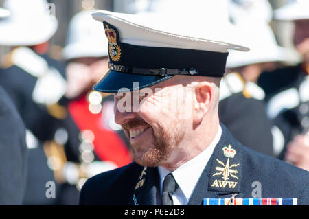 Glasgow, Scotland, UK. 30th June, 2018. Armed Forces Day. A parade through the city centre from Holland Street to George Square is led by the Royal Marine Band and includes serving military, cadets, youth organisations and veteran associations. Credit: Skully/Alamy Live News Stock Photo
