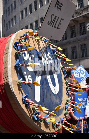 London, UK. 30th June 2018.  'NHS at 70: Free, for all, forever', protest march through central London on its 70th birthday. Stock Photo