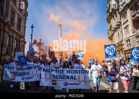 London, UK, 30 June 2018. NHS 70th Anniversary March organised by People's Assembly passing by Nelson's Column at Trafalgar Square, London, UK, 30/06/2018 Credit: Bjanka Kadic/Alamy Live News Stock Photo