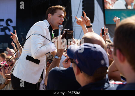 Finsbury park, UK. 30th June, 2018, Swedish rock band The Hives Featuring Pelle Almqvist, Niklas Almqvist, Christian Grahn, Dr. Matt Destruction, Vigilante Carlstroem, Randy Fitzsimmons performing at Queens of the Stone Age and Friends.UK.Finsbury park London.© Jason Richardson / Alamy Live News Stock Photo