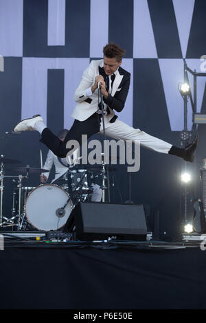 Finsbury park, UK. 30th June, 2018, Swedish rock band The Hives Featuring Pelle Almqvist, Niklas Almqvist, Christian Grahn, Dr. Matt Destruction, Vigilante Carlstroem, Randy Fitzsimmons performing at Queens of the Stone Age and Friends.UK.Finsbury park London.© Jason Richardson / Alamy Live News Stock Photo