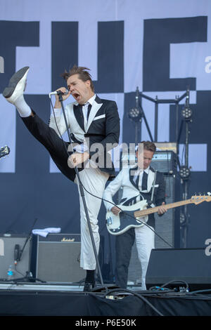 Finsbury park, UK. 30th June, 2018, Swedish rock band The Hives Featuring Pelle Almqvist, Niklas Almqvist, Christian Grahn, Dr. Matt Destruction, Vigilante Carlstroem, Randy Fitzsimmons performing at Queens of the Stone Age and Friends.UK.Finsbury park London.© Jason Richardson / Alamy Live News Stock Photo