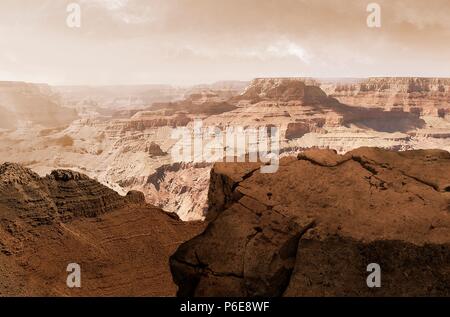 Illustration of the Valles Marineris canyon system on Mars as the Sun sets. The Valles Marineris is over 4000 kilometres (km) long, up to 200 km wide and up to 7 km deep, dwarfing the Grand Canyon of Arizona, USA. The canyons are found on the southeastern edge of the Tharsis Bulge and were originally created by faulting during the formation of Tharsis. The canyons have been further worn down by water and wind erosion. Finally, slumping has helped widen the canyon so that the bottom is visible from space. Stock Photo