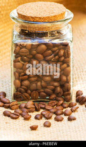 Roast coffee beans on burlap Stock Photo