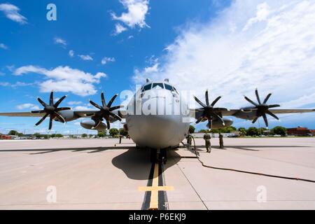 A C-130H aircraft assigned to Wyoming Air National Guard sits on the runaway at Rosecrans Air National Guard Base, St. Joseph, Mo., June 26, 2018. The aircraft was the first of its kind to receive new 8 bladed propellers in the Air National Guard. (U.S. Air National Guard photo by Senior Airmen Andrew Rivera) Stock Photo