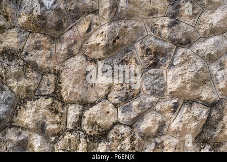 Old stone wall as texture or background. Old exterior wall with big rocks Stock Photo