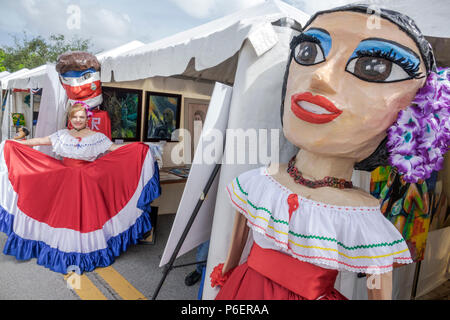 Florida,Coral Gables,Hispanic Cultural Festival,Latin American Barranquilla Carnival tent,big head figure,Hispanic woman female women,traditional dres Stock Photo